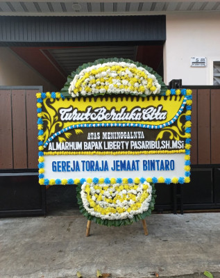 Papan Bunga Duka di Pasar Pagi